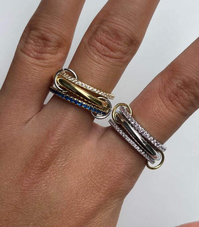 Bağ formlu zirkon taş detaylı 316L çelik yüzük – Süslü Jewellery altın, gümüş ve mavi taşlı seçenekleriyle